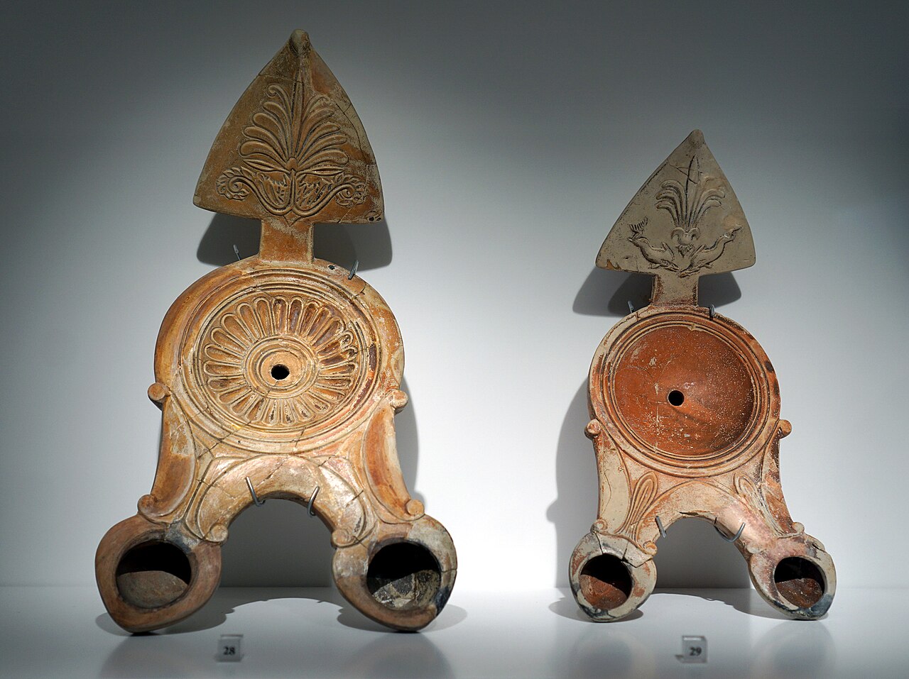 Ancient oil lamps photographed in the Archaeological Museum of Pafos